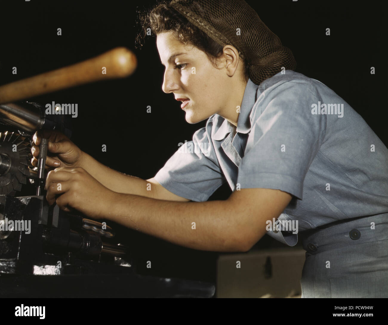 working on transport parts in the hand mill, Consolidated Aircraft Corp