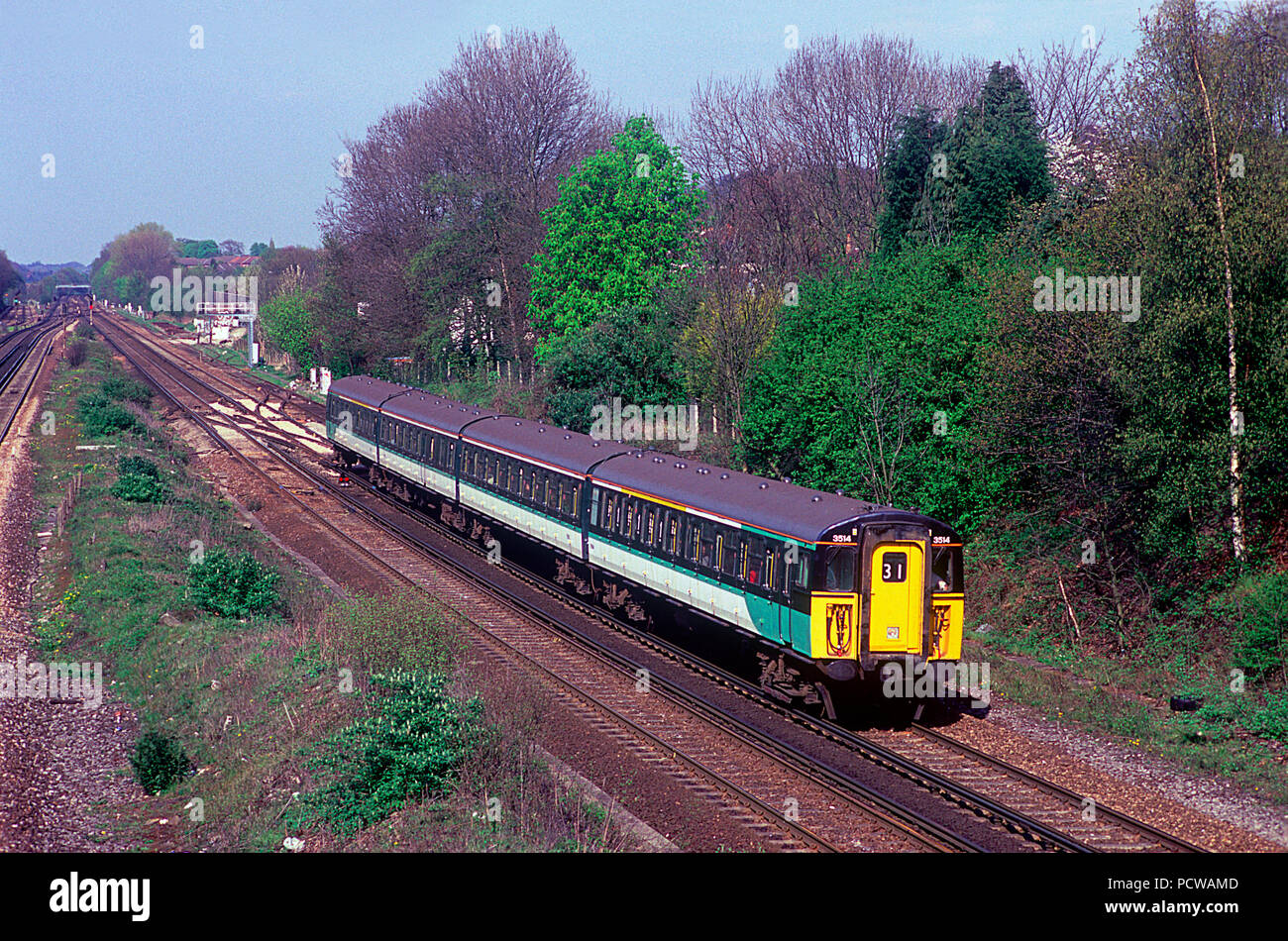 Class 423 4-Vep number 3514 freshly painted into Southern Railway livery but without the decals at Stoats Nest Junction near Coulsdon on the 16th April 2002. Stock Photo