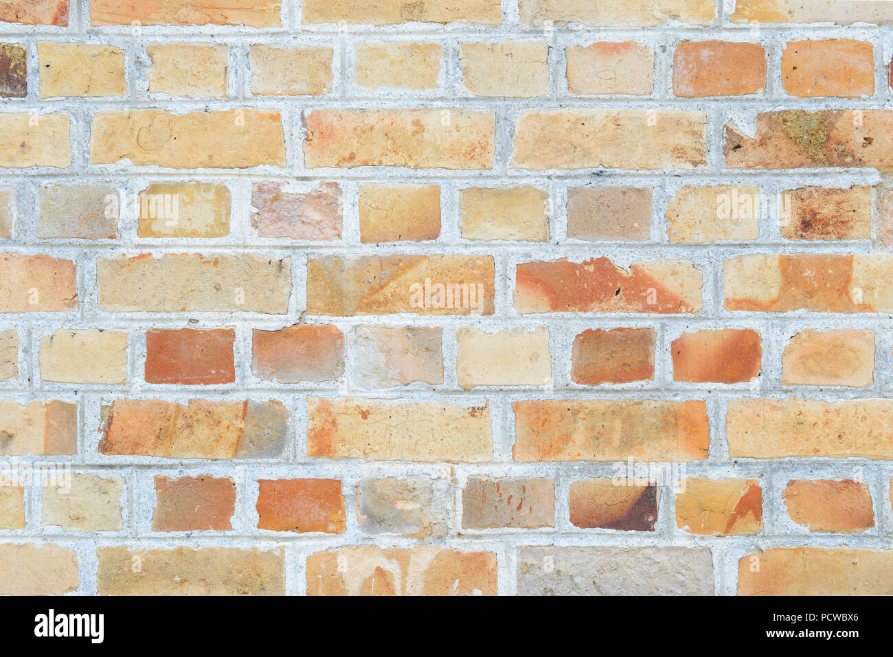 Orange brick wall texture background Stock Photo - Alamy