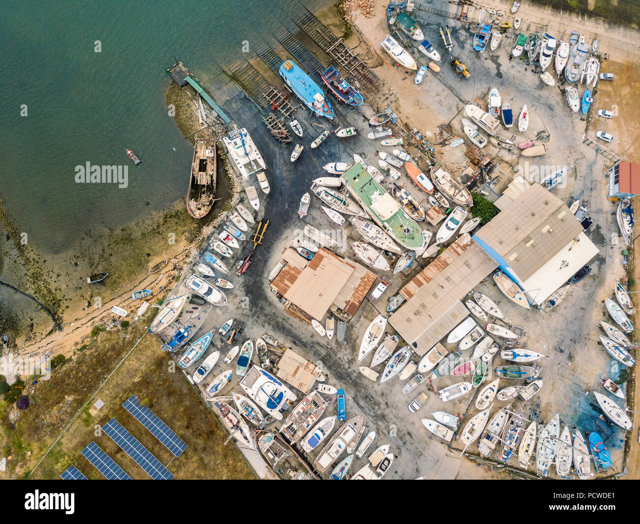 Aerial view of dry docks and shipyard with many boats in Olhao, Portugal Stock Photo