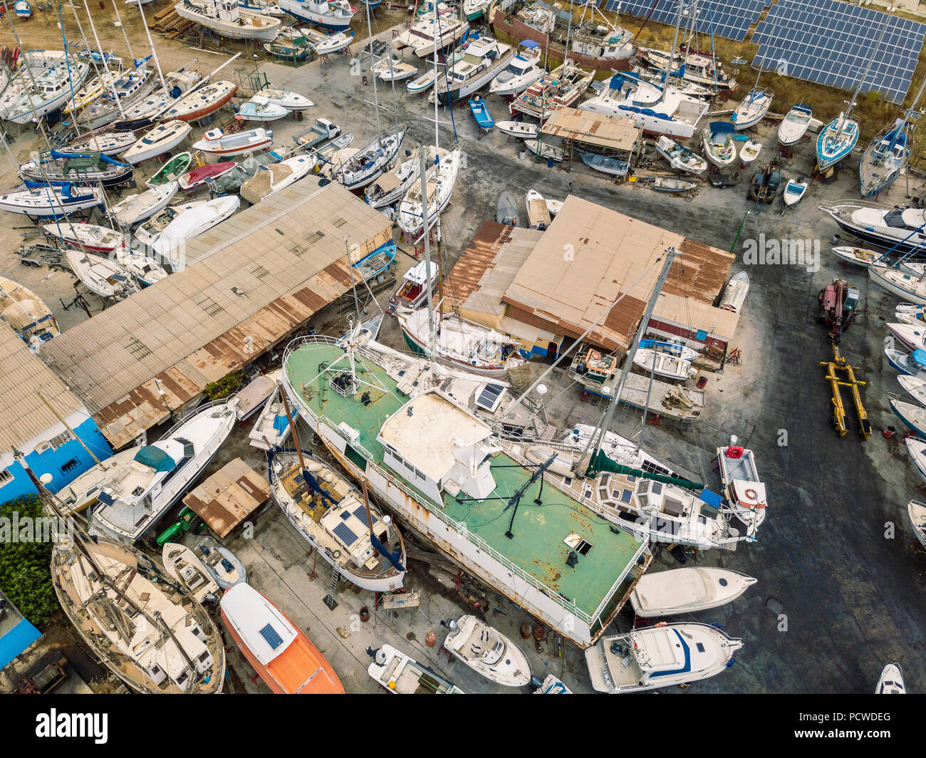 Aerial view of dry docks and shipyard with many boats in Olhao, Portugal Stock Photo