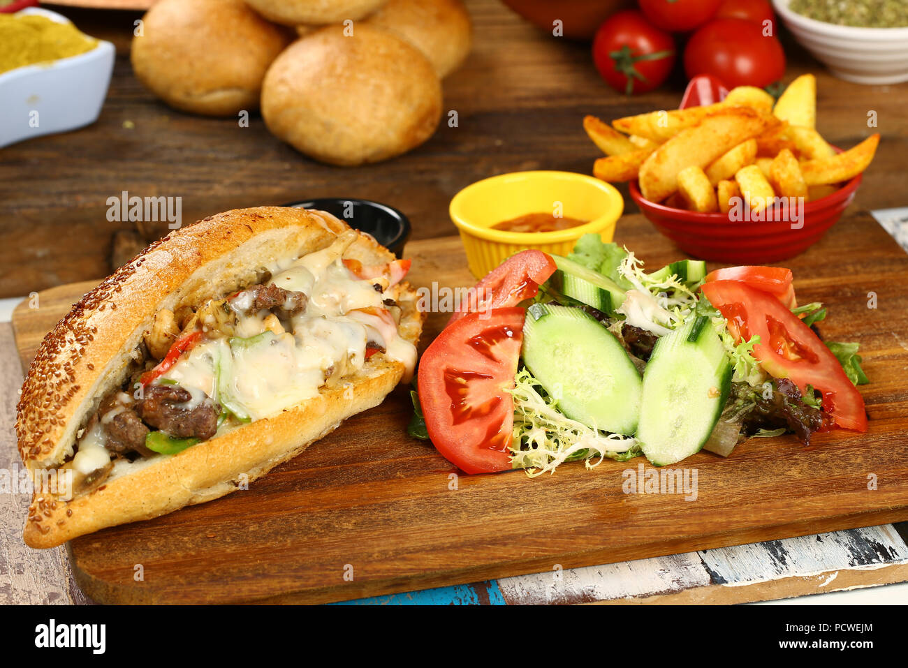 Philly beef steak cheese submarine sandwich Stock Photo - Alamy