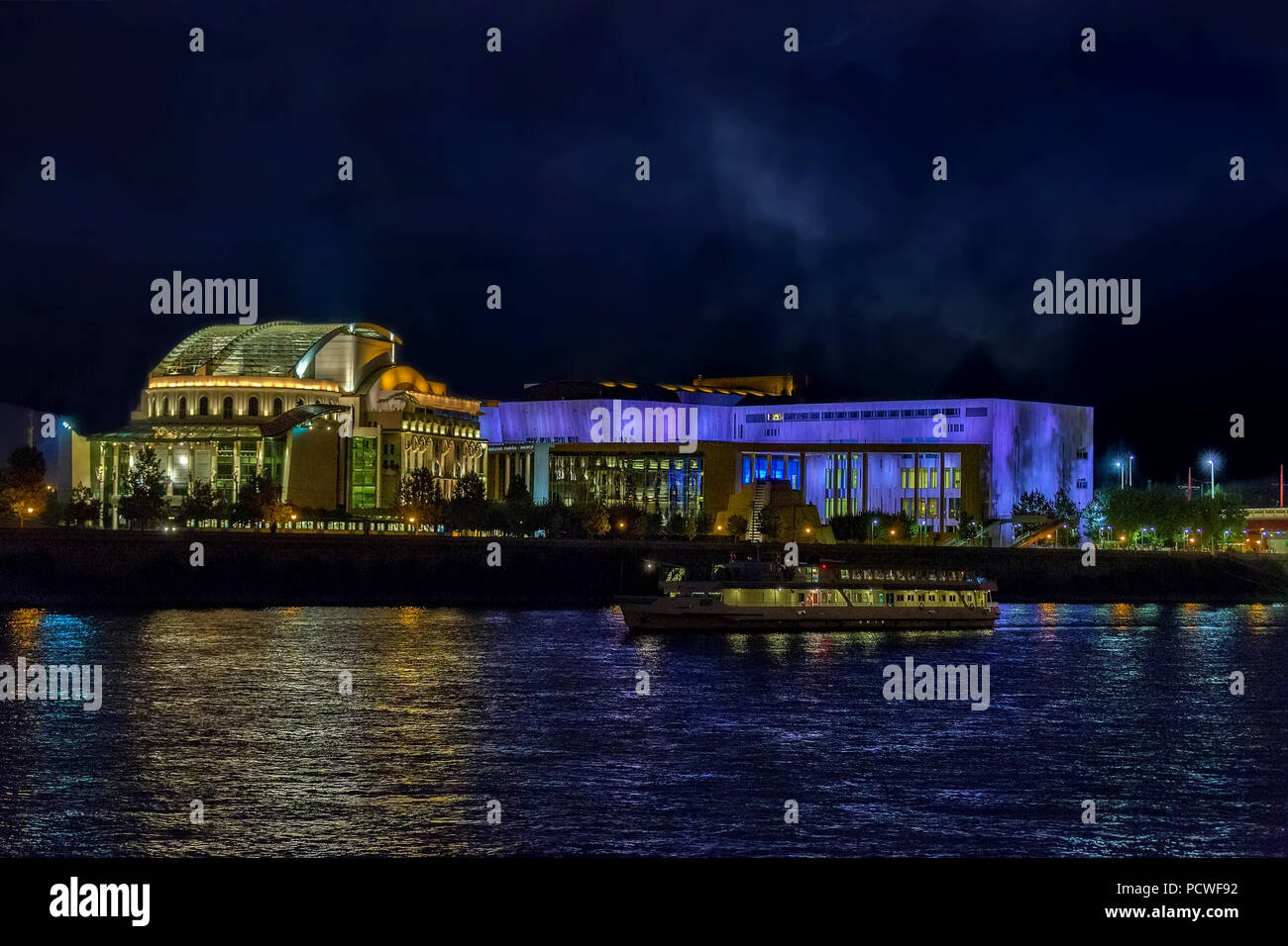 Night view of modern buildings of National Theater and the Palace of Art from the river Danube at Budapest,Hungary. Stock Photo