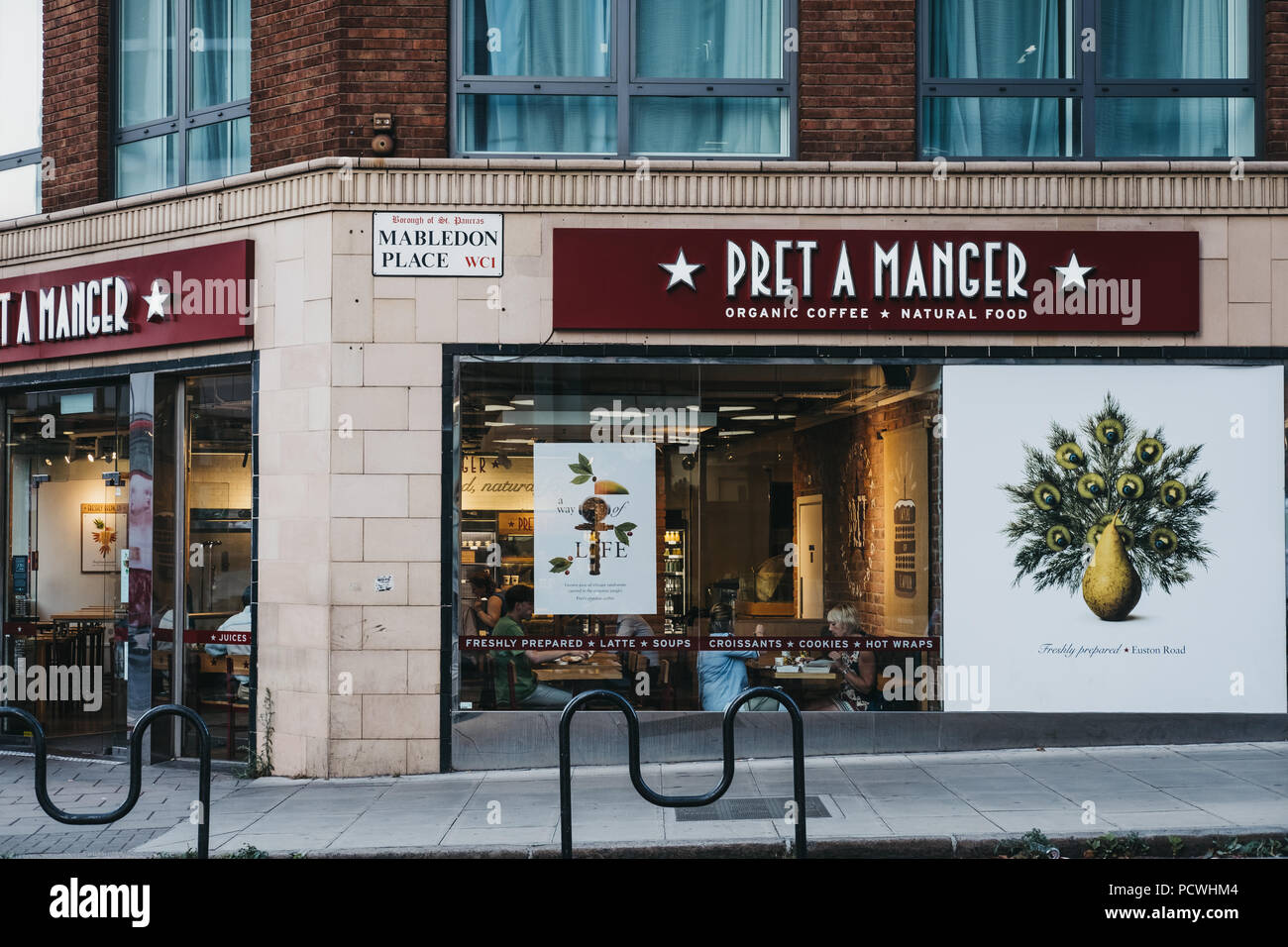 Facade of a Pret A Manger shop in King's Cross, London, UK. Stock Photo