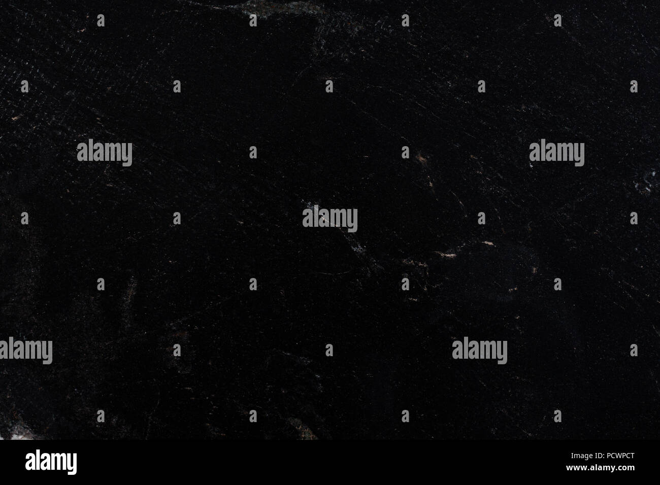 Black marble texture with relief. Stock Photo