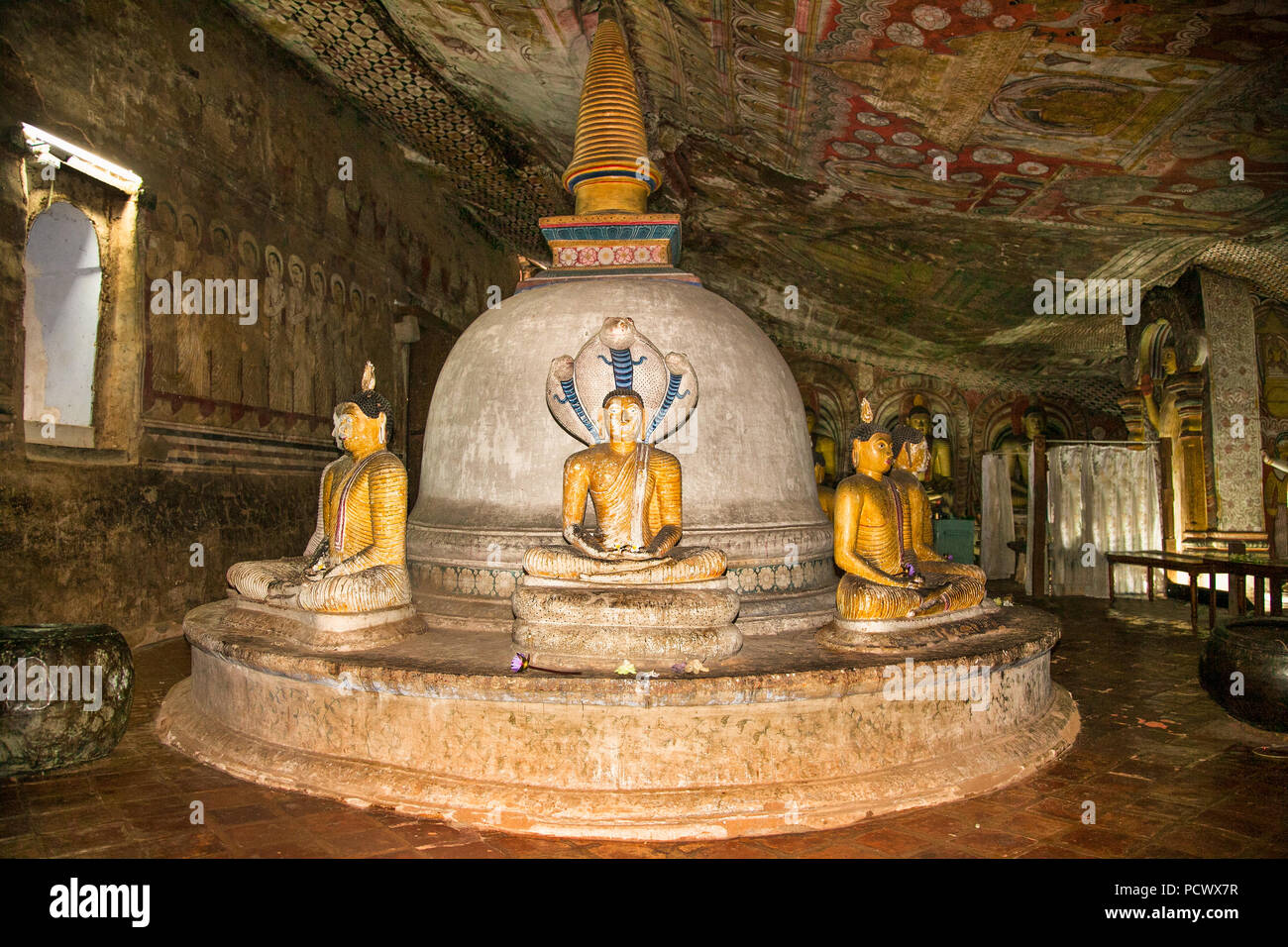 DAMBULLA SRI LANKA - DEC 27, 2016: Buddha statues inside Dambulla Cave Temple. Cave Temple is a World Heritage Site near Dambulla city on Dec 27, 2016 Stock Photo