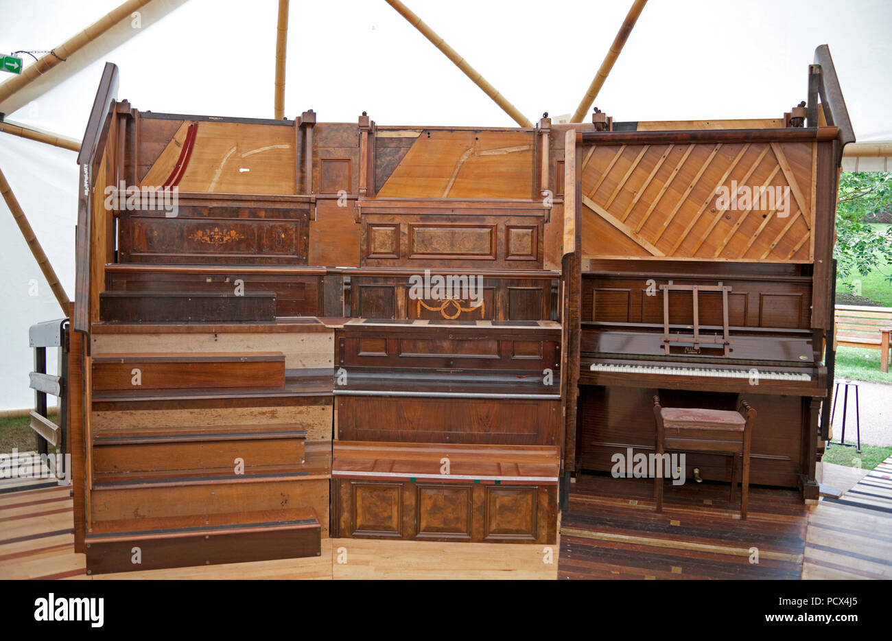 Botanic Gardens, Edinburgh, Scotland, 4 Aug 2018. Pianodrome, the world's first ampitheatre made entirely from upcycled pianos,  part of the Fringe Festival 2018. Stock Photo