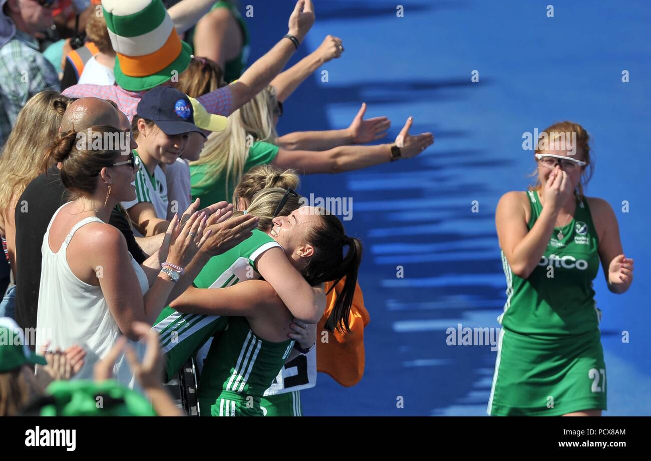 Yvonne O'Byrne (IRL) celebrates the win with the fans, watched by Zoe Wilson (IRL). Ireland V Spain. Match 34. Semifinal. Womens Hockey World Cup 2018. Lee Valley hockey centre. Queen Elizabeth Olympic Park. Stratford. London. UK. 04/08/2018. Stock Photo