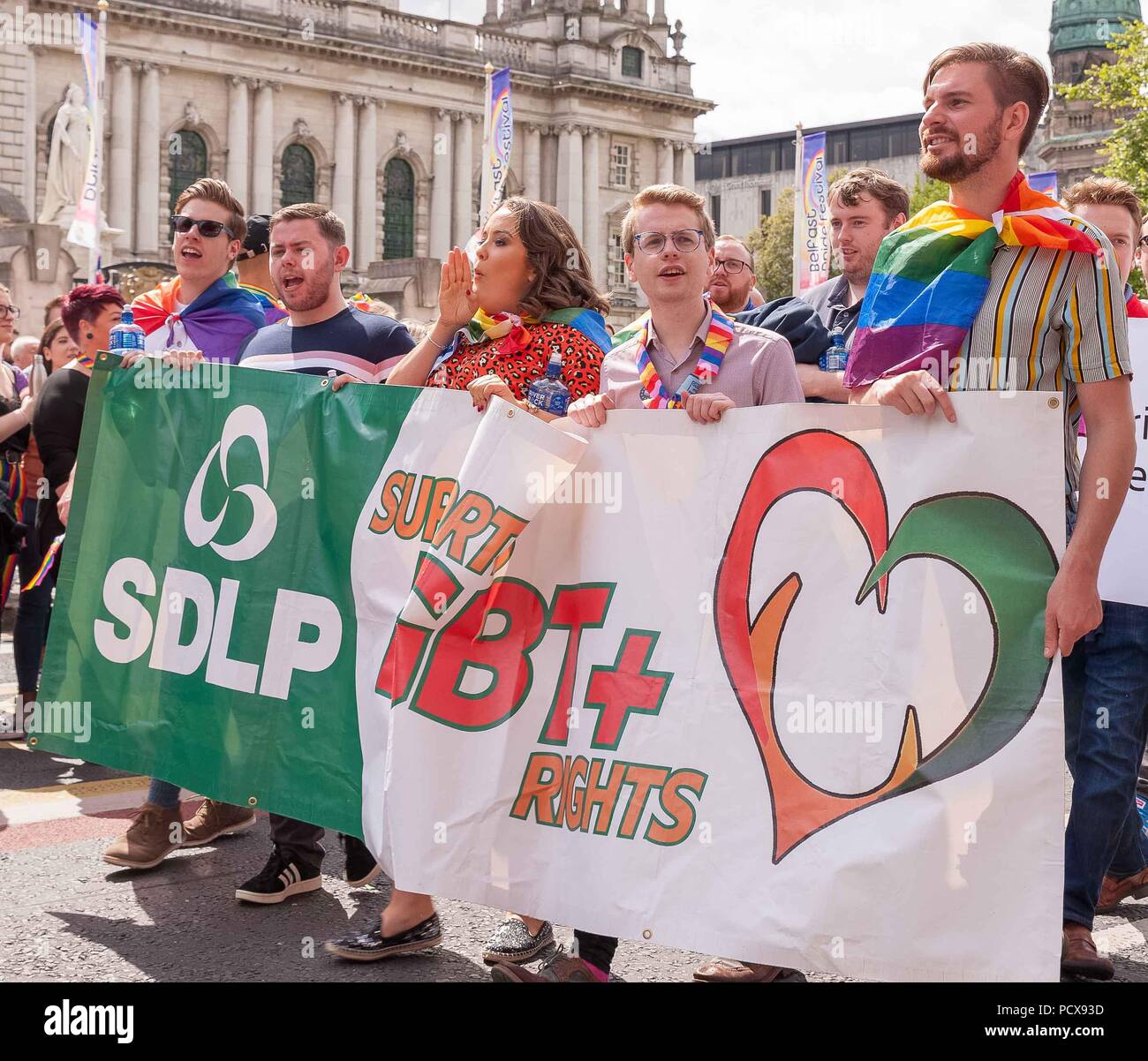 Belfast, Northern Ireland, U.K. 04 August 2018. Pride Belfast Parade through the City Centre from Custom House Square, part of Pride 2018. A small evangelical protest was held outside the City Hall during the parade. Credit: John Rymer/Alamy Live News Stock Photo