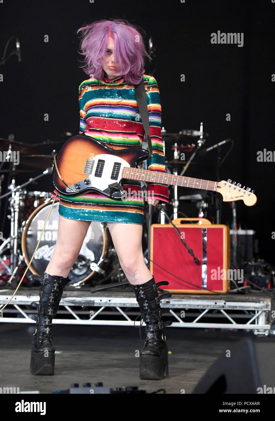 Black Honey, lead singer and guitarist Izzy Baxter performs on stage at Bestival, Dorset, UK Credit: Finnbarr Webster/Alamy Live News Stock Photo
