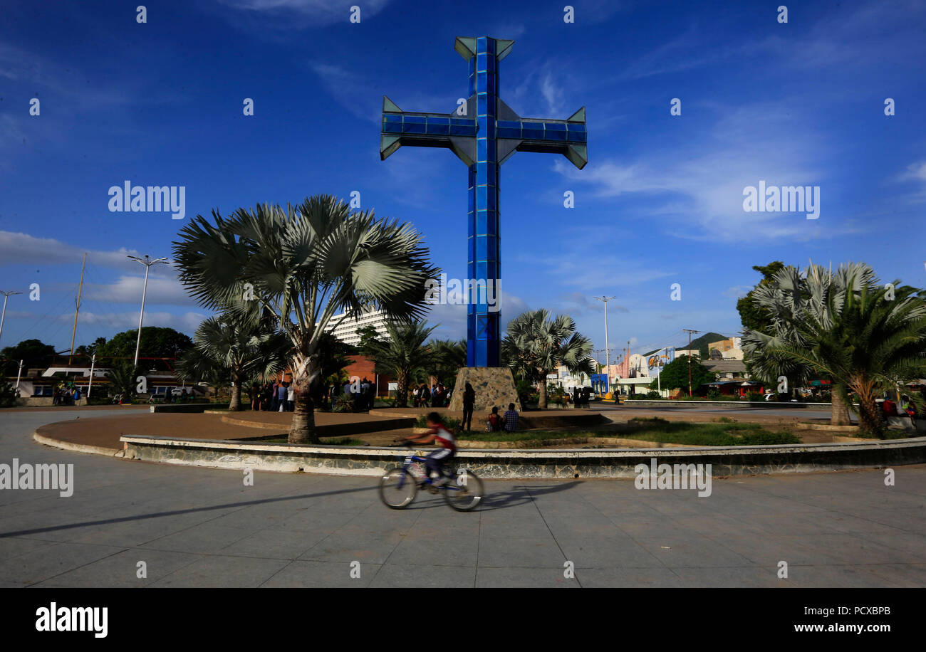 Puerto La Cruz, Anzoategui, Venezuela. 3rd Aug, 2018. August 03, 2018. Cross of the Paseo Col''”n, icon of the city.The Paseo de La Cruz and El Mar1 also known as El Paseo Col''”n is a wide promenade located north of Puerto la Cruz, a city in the northwest of Venezuela. It was inaugurated on May 3, 1967. It is known by that name because of the square that in honor of Christopher Columbus was on the eastern side of the promenade. Today the walk has a wide avenue and a large pedestrian area. In this space the traditional artisans of Puerto La Cruz are located. The Paseo Col''”n is a must-see Stock Photo