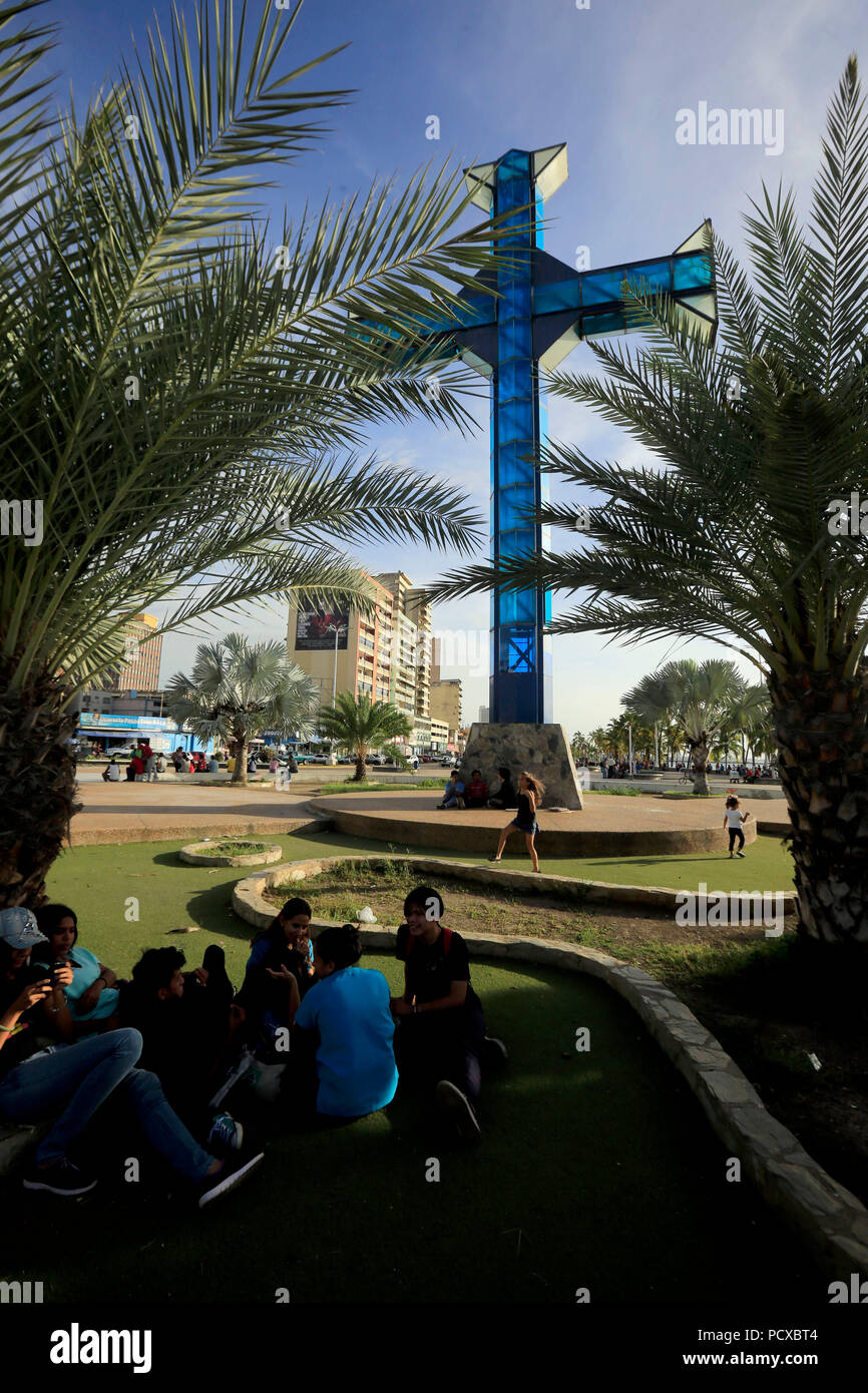 Puerto La Cruz, Anzoategui, Venezuela. 3rd Aug, 2018. August 03, 2018. Cross of the Paseo Col''”n, icon of the city.The Paseo de La Cruz and El Mar1 also known as El Paseo Col''”n is a wide promenade located north of Puerto la Cruz, a city in the northwest of Venezuela. It was inaugurated on May 3, 1967. It is known by that name because of the square that in honor of Christopher Columbus was on the eastern side of the promenade. Today the walk has a wide avenue and a large pedestrian area. In this space the traditional artisans of Puerto La Cruz are located. The Paseo Col''”n is a must-see Stock Photo