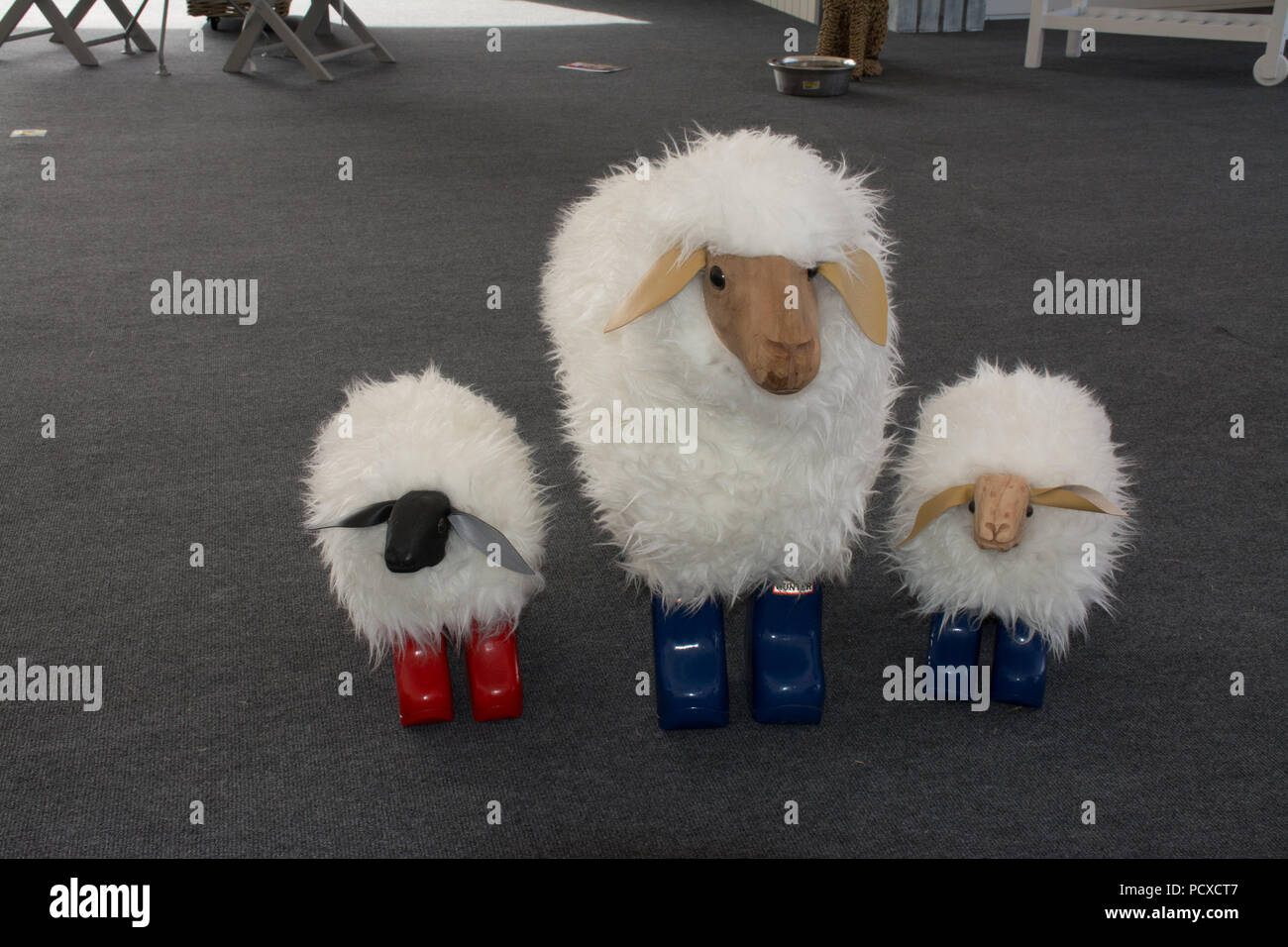 Toy sheep in wellingtons for sale at a country show Stock Photo Alamy