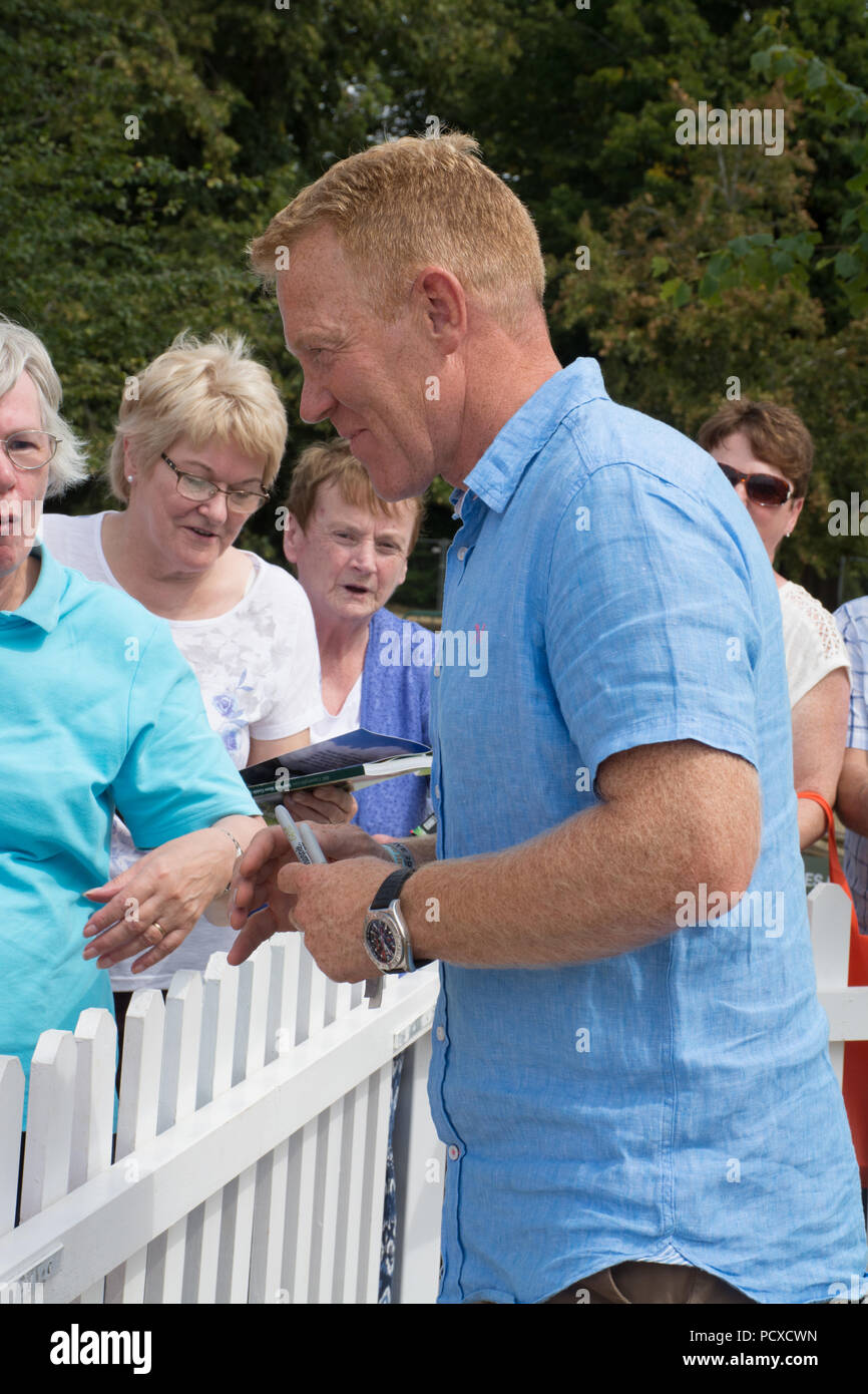 Oxfordshire, UK. 4th August, 2018. Thousands of people went to the Countryfile Live show on a hot, sunny day. There were opportunities to see and meet Countryfile presenters, including Adam Henson, pictured here signing autographs. Stock Photo