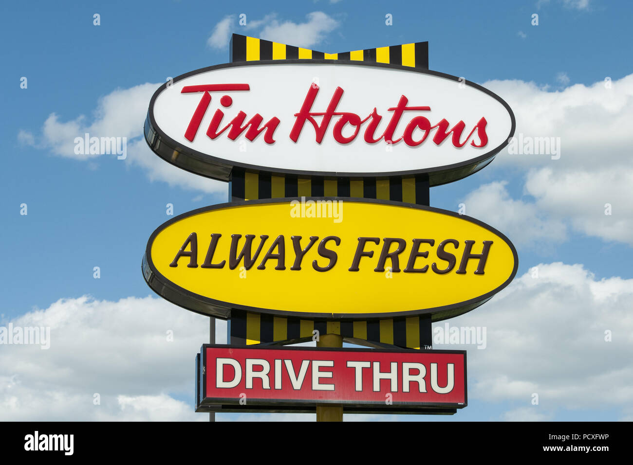 Brooks, Alberta, Canada. 21st Aug, 2013. A Tim Hortons restaurant and Drive Thru sign. Credit: Bayne Stanley/ZUMA Wire/Alamy Live News Stock Photo