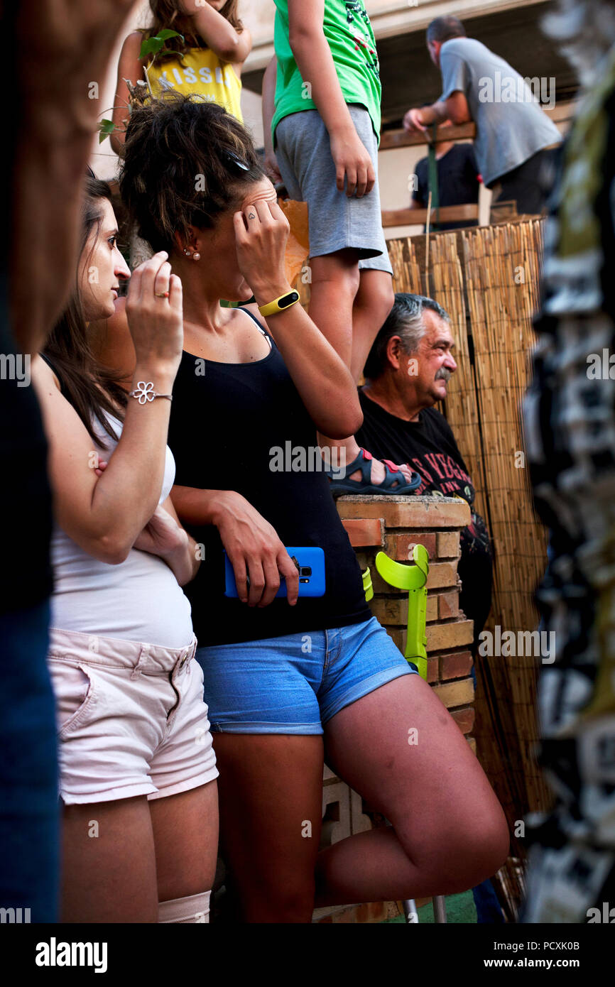 locals waiting for the 'bull running' to start, Cherta, Tarragona, Spain. Stock Photo