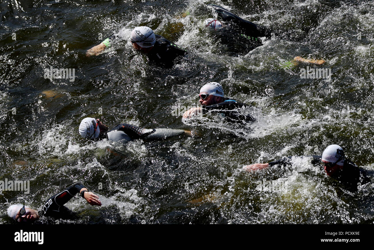 Aj bell london triathlon start event royal victoria docks hires stock