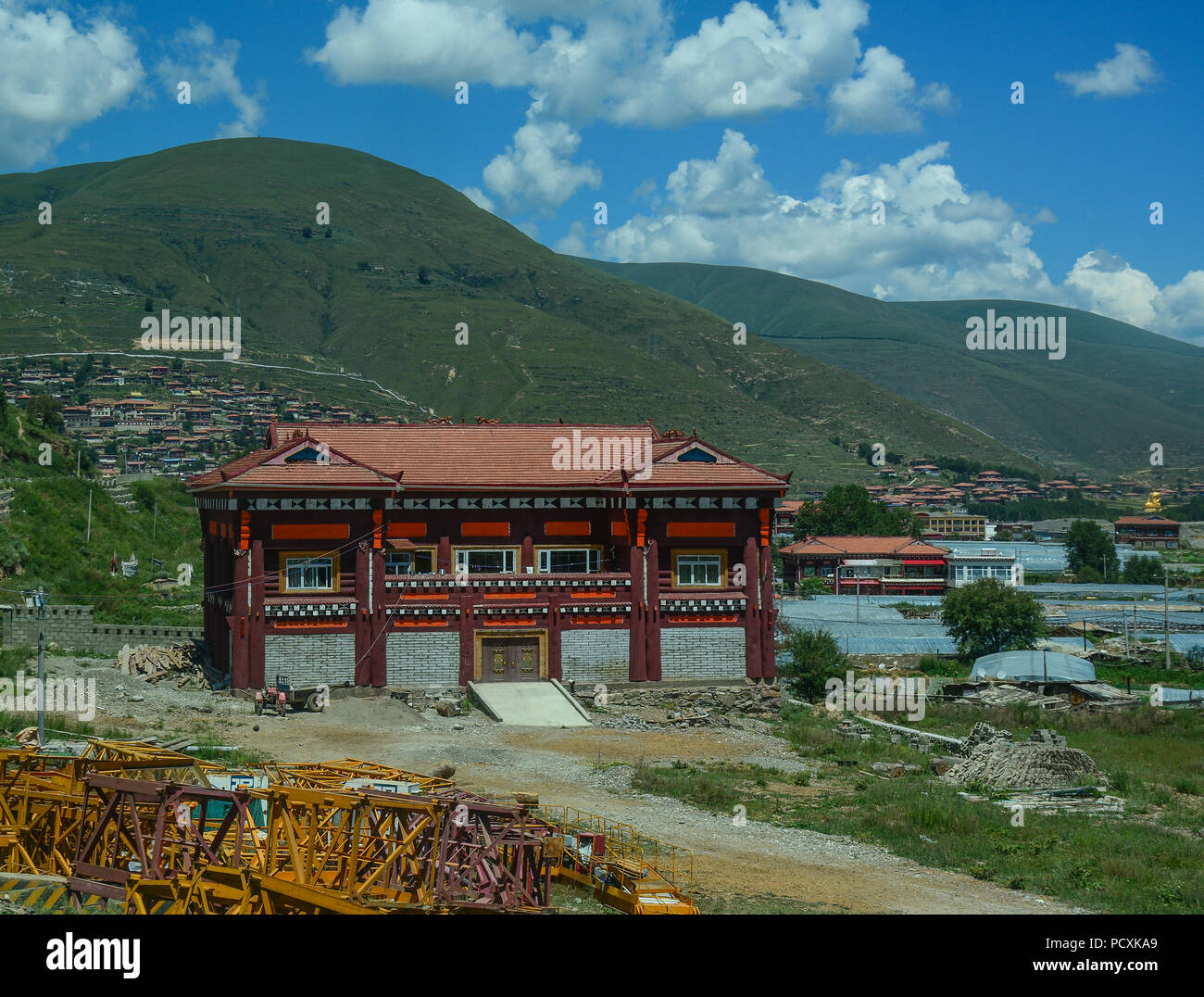Daocheng, China - Aug 15, 2016. Mountain township in Daocheng, China. Daocheng is located in the eastern Hengduan Mountains, Sichuan Province. Stock Photo