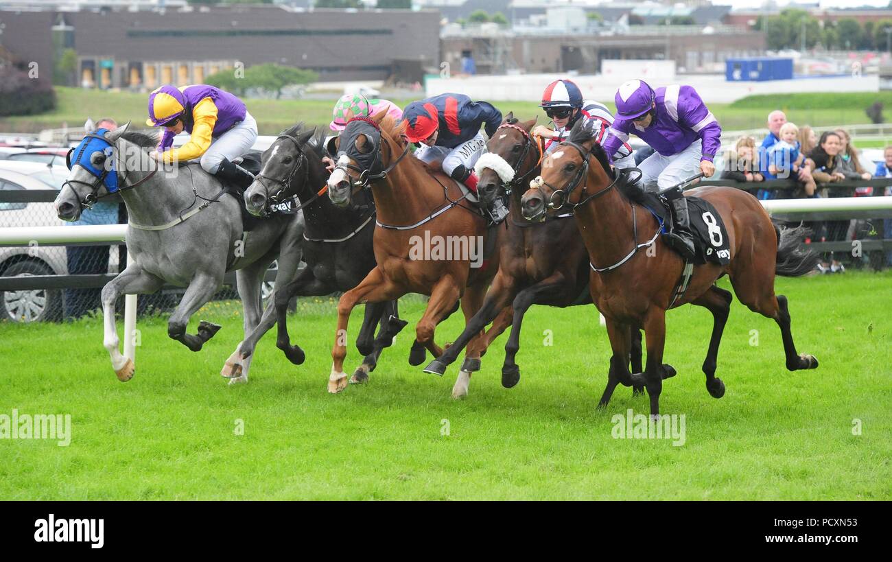 Rinty Magnity ridden by Danny Sheehy (second right) win the Betway Irish EBF Nursery Handicap during day six of the Galway Summer Festival at Galway Racecourse. Stock Photo