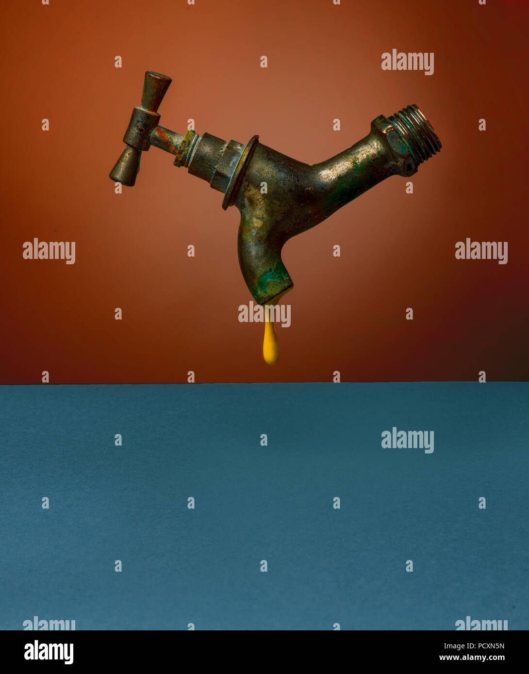 concept photo of a tap with yellow water Stock Photo Alamy