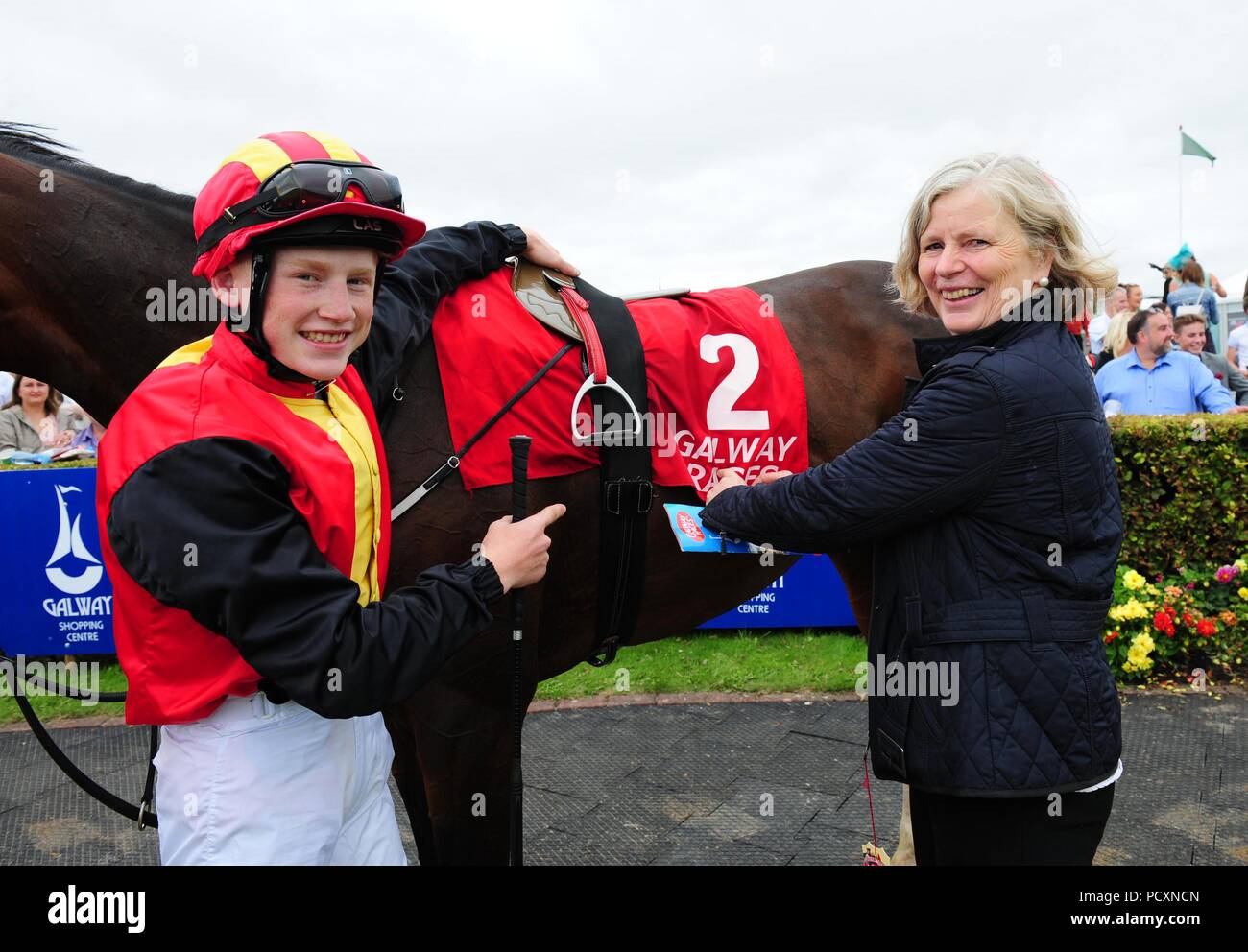 Trainer Sheila Lavery and jockey Gavin Ryan with Truffles after winning the Ardilaun Hotel Handicap during day six of the Galway Summer Festival at Galway Racecourse. Stock Photo
