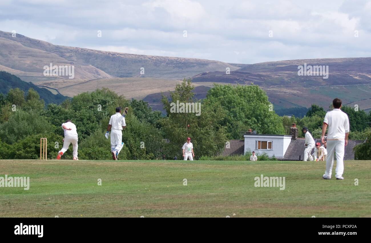 Cricket action in the second eleven match between Dinting and Stalybridge St Paul's. Stock Photo