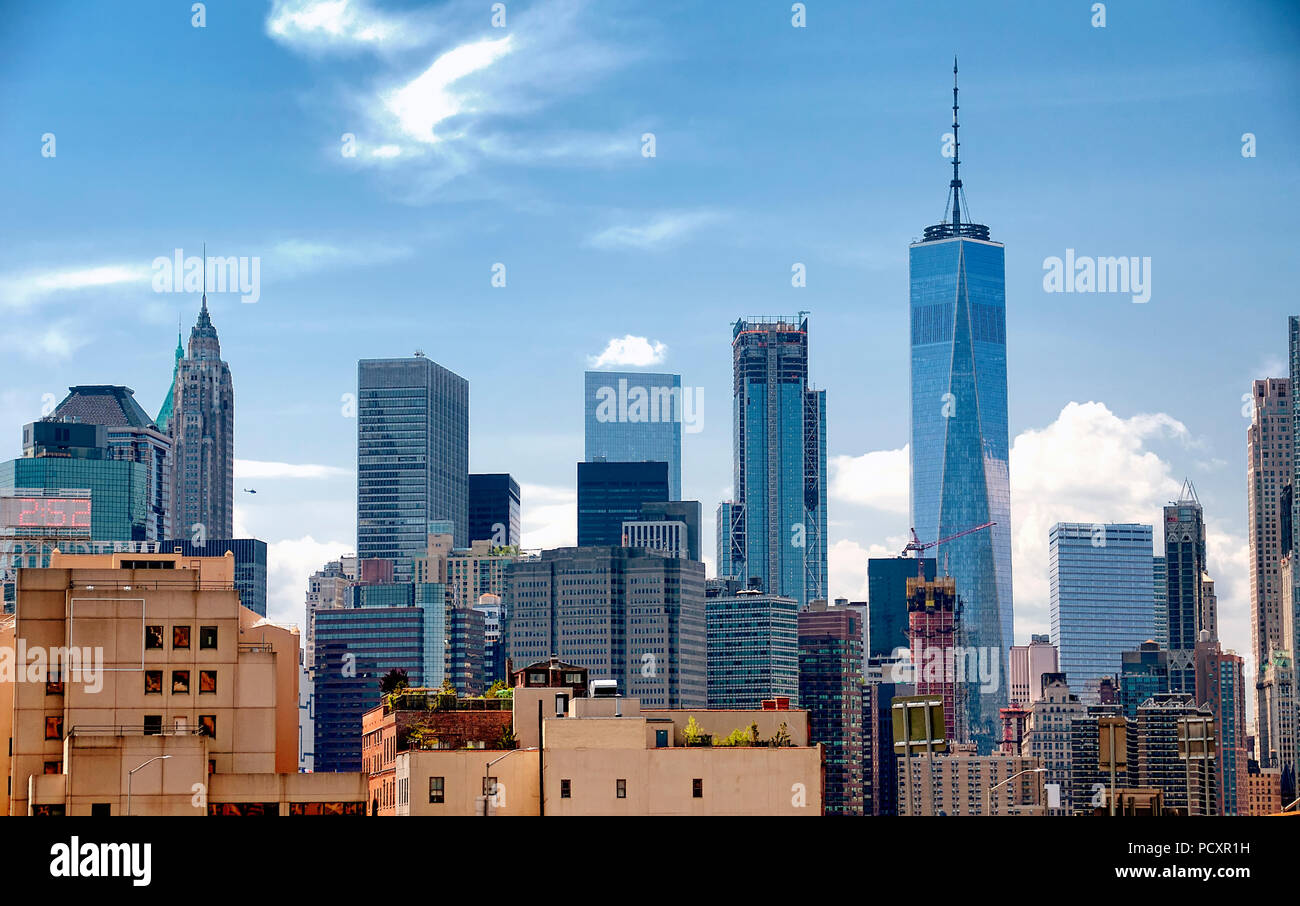 The buildings of the new york city skyline on a sunny day in the ...