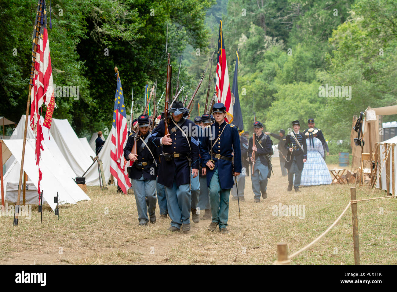 Duncan Mills, CA - July 14, 2018: Re-enactors at the Northern California's Civil war reenactment. Union army marching on camp. This event is one of th Stock Photo