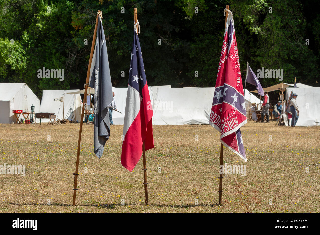 Duncan Mills, CA - July 14, 2018: Confederate flags marking confederate camp at the Northern California's Civil war reenactment. This event is one of  Stock Photo