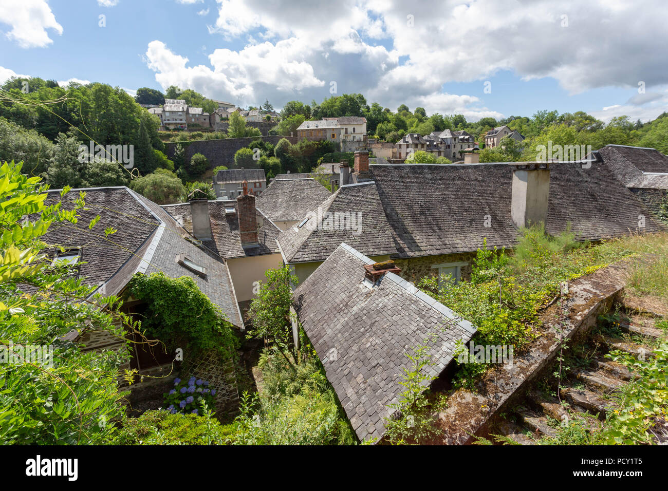 FRANCE, VIGEOIS - JULY 17, 2018: View over the old slated roofs of the medieval village. Stock Photo