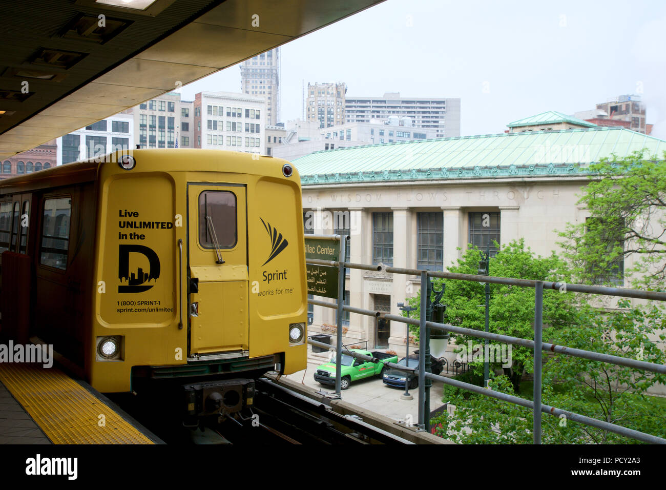 DETROIT, MICHIGAN, UNITED STATES - MAY 22nd, 2018: The Detroit People Mover public transit system enters a station. The elevated monorail is one of many public modes of transportation in the city Stock Photo