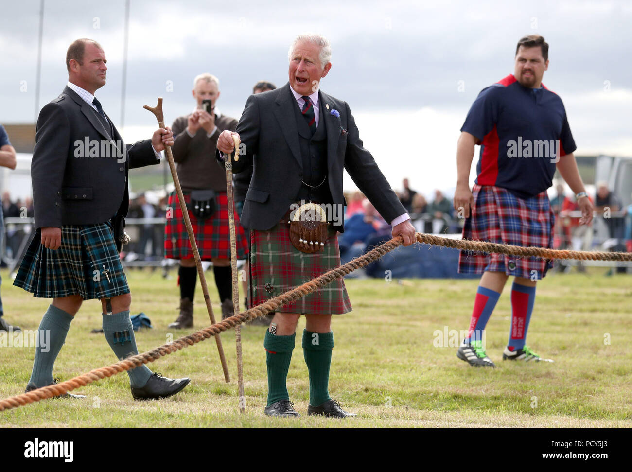 The Prince of Wales, known as the Duke of Rothesay in Scotland, judges the tug-of-war with wounded and injured ex-armed forces taking part during the Mey Highland & Cultural Games at the John O'Groats Showground in Caithness. Stock Photo