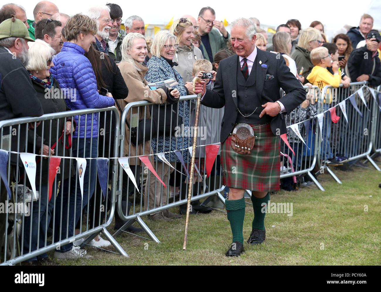 The Prince of Wales, known as the Duke of Rothesay in Scotland, meets with crownds, as he attends the Mey Highland & Cultural Games at the John O'Groats Showground in Caithness. Stock Photo