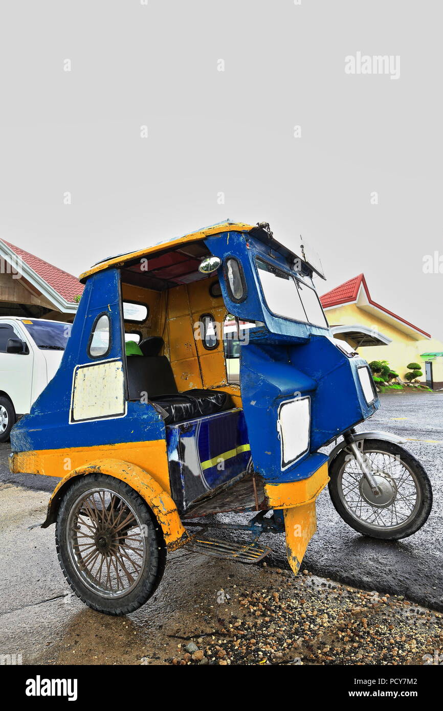 Colorist motor tricycles are a common means of public transportation in