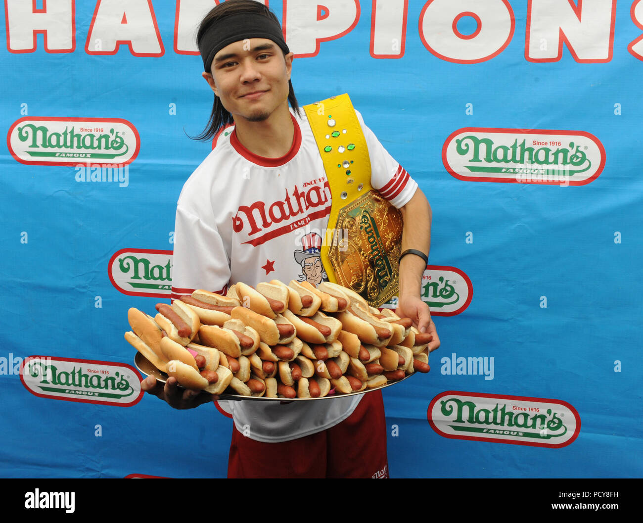 new-york-ny-july-04-matt-stonie-eats-62-hot-dogs-to-upset-joey