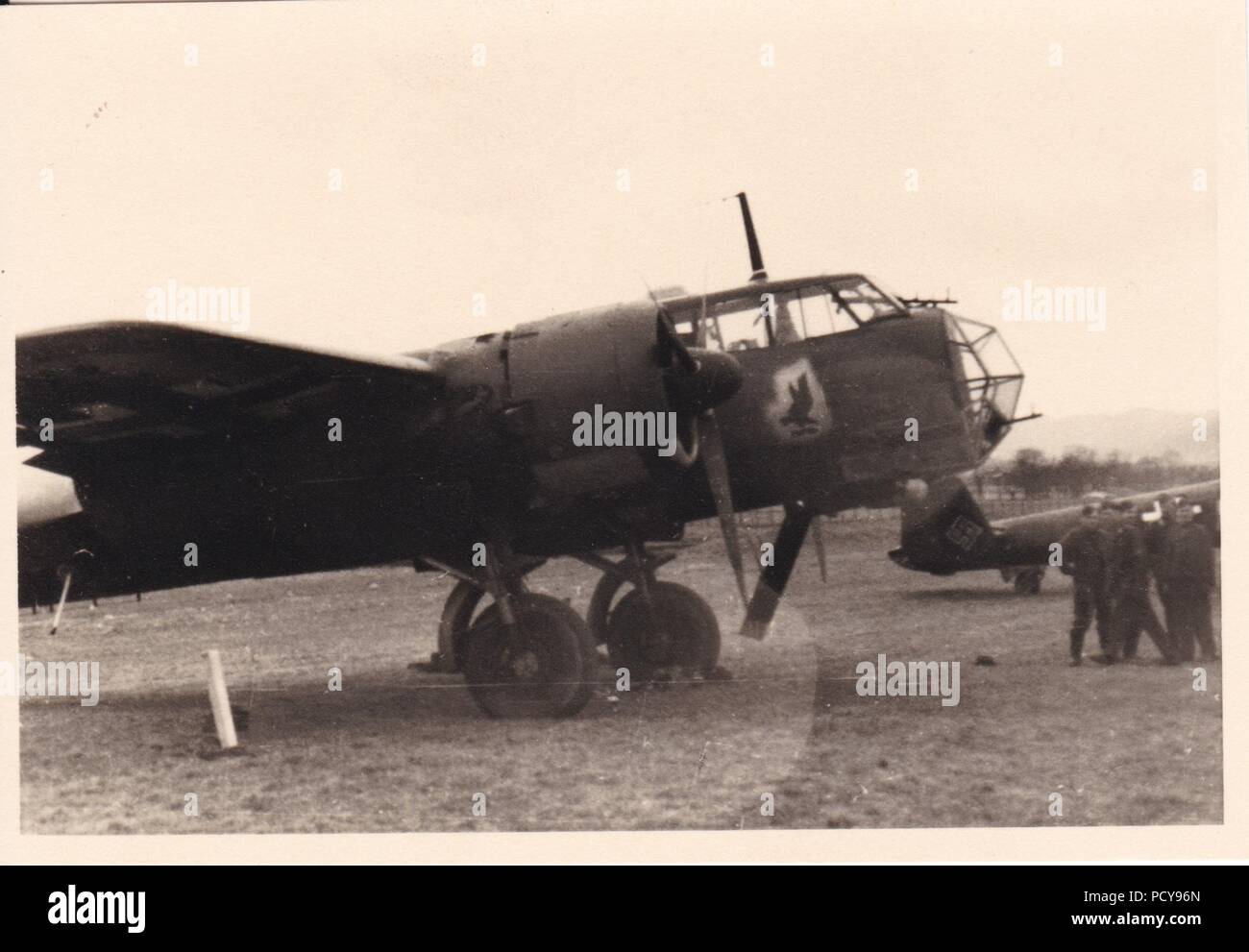 Armed and ready for another mission, a Dornier Do 17Z of 1./Staffel, Kampfgeschwader 2 stands on Epinoy Airfield during the Battle of Britain, summer 1940. The distinctive Staffel Badge of 1,/KG 2 can be seen on the side of the aircraft, under the cockpit. Stock Photo