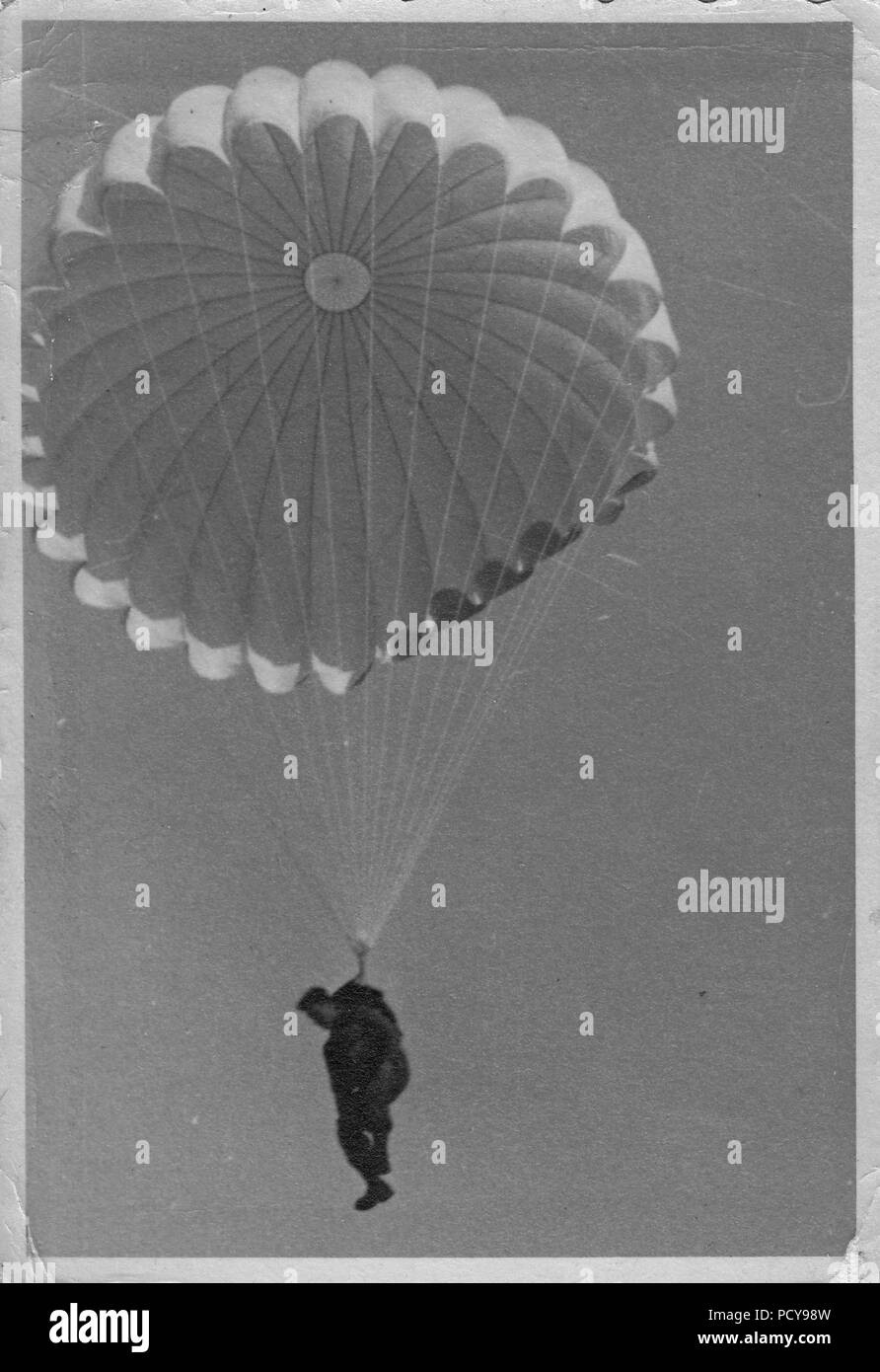 Fallschirmjäger Otto Thomas descends on his first parachute jump, 1st December 1937. Stock Photo