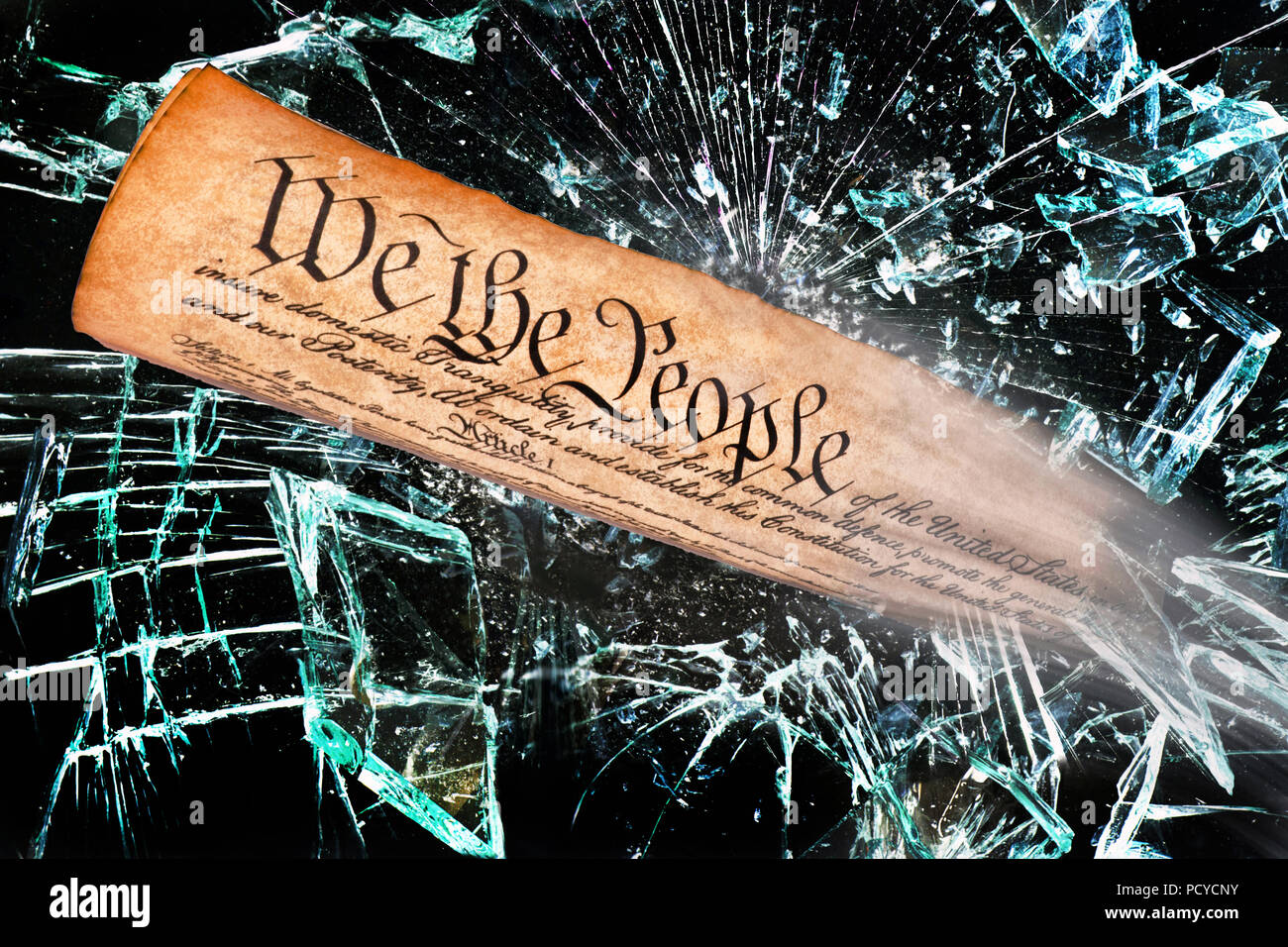 We the people breaking through the broken glass. Stock Photo