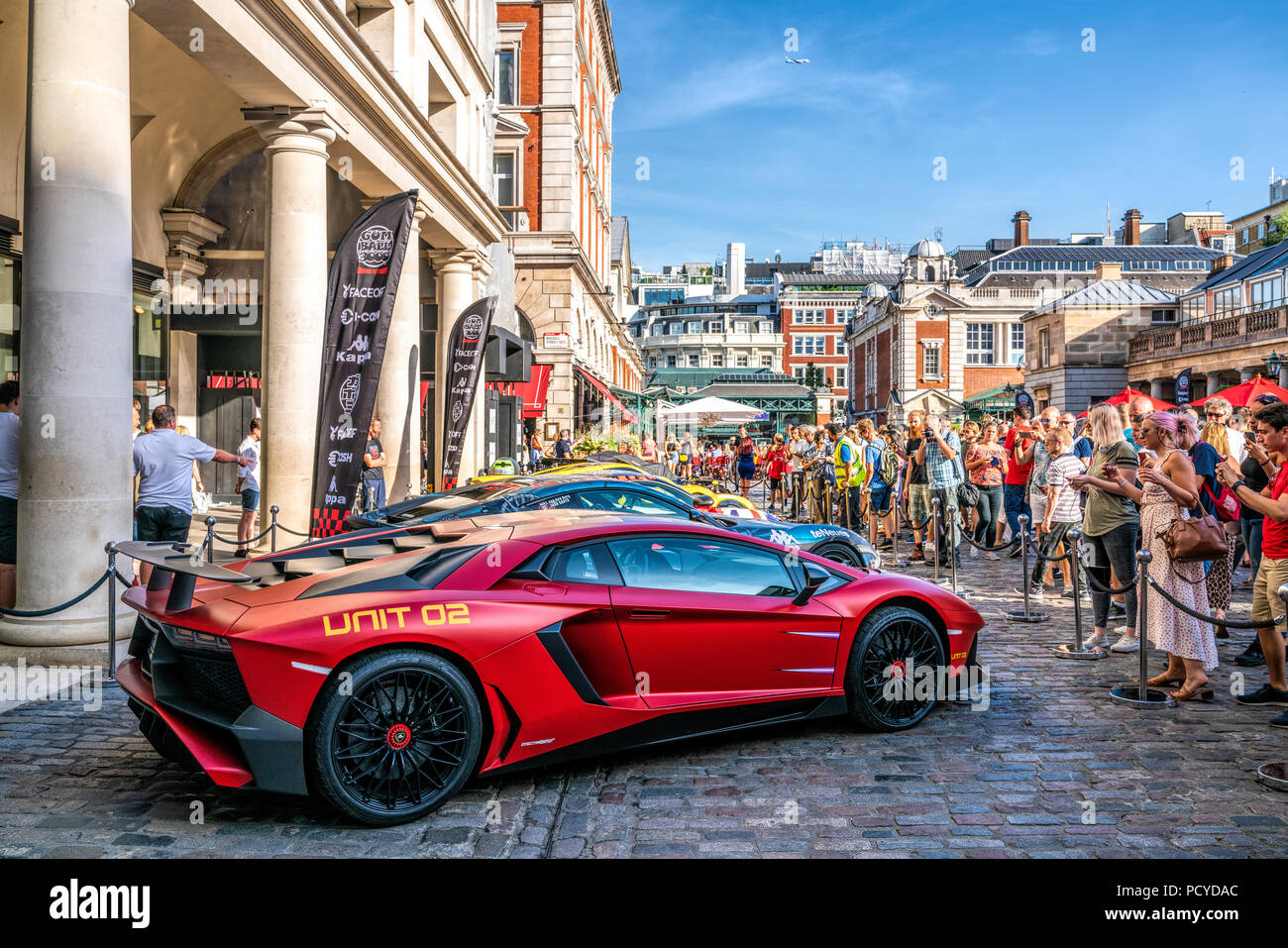 4 Aug 2018 - London, UK. Charity rally event Gumball 3000. Lamborghini Aventador LP750-4 supercar in red displayed at Covent Garden, London. Stock Photo