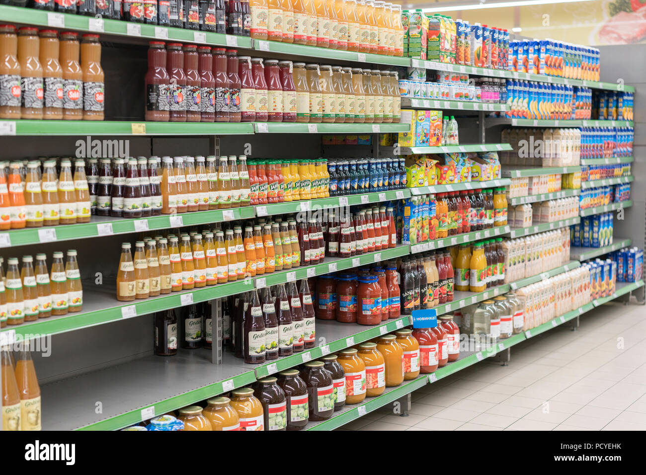 Kiev, Ukraine. July 15 2018. Fruit juices on shelves in a supermarket
