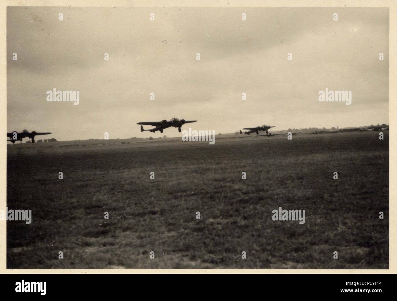 Image from the photo album of Oberfeldwebel Gotthilf Benseler of 9. Staffel, Kampfgeschwader 3: A 'Kette' of Dornier Do17Z-2s of 9. Staffel, Kampfgeschwader 3 takes off to attack targets in Poland, September 1939. Just discernible in this image are the early 'Ace of Hearts' Staffel badges carried on the sides of the aircraft. This badge was inherited from the unit's predecessor 9./KG 153. In later versions, the Staffel badge showed only the red heart and the large, white playing card was omitted. Stock Photo