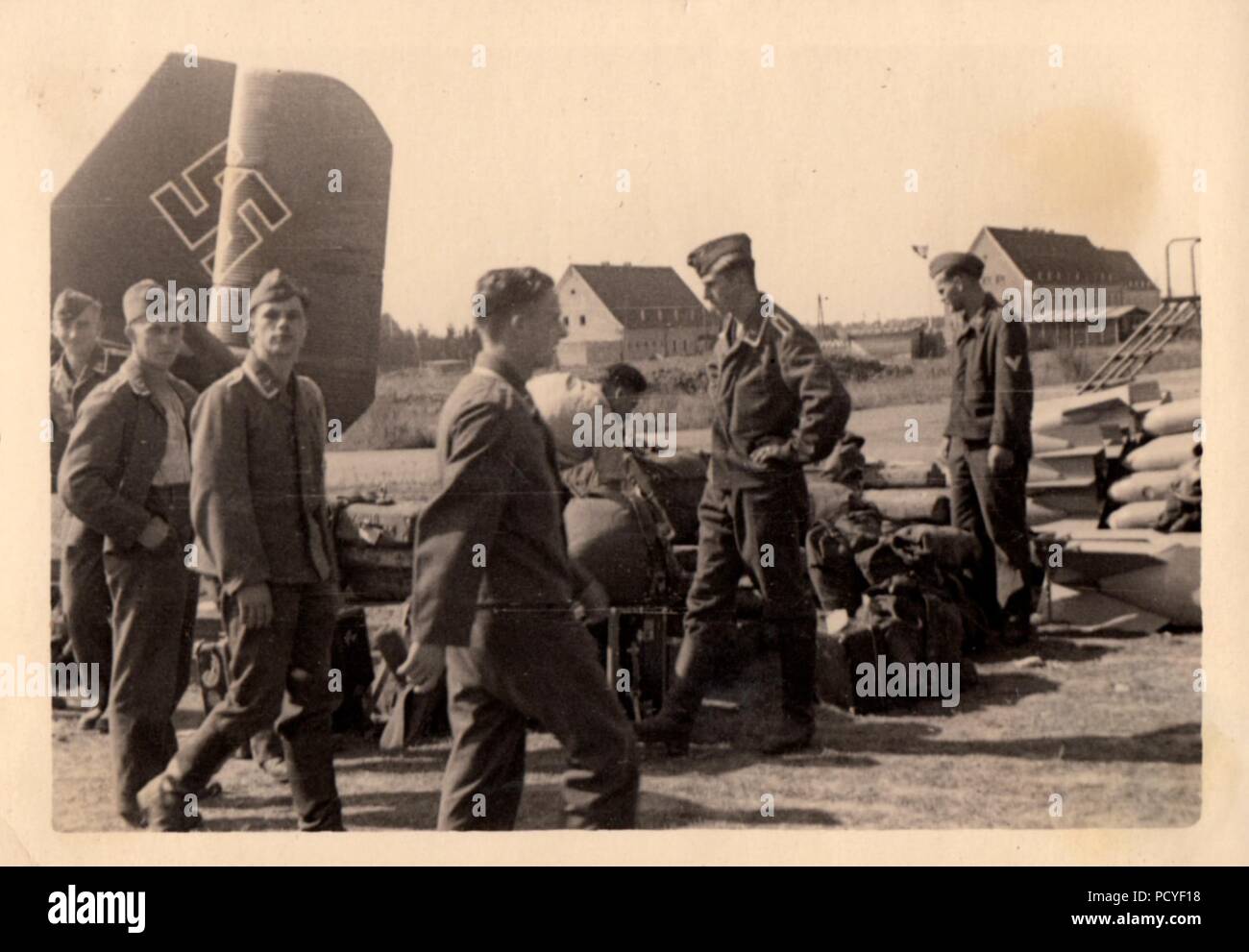Image from the photo album of Oberfeldwebel Gotthilf Benseler of 9. Staffel, Kampfgeschwader 3: Armourers of 9. Staffel, Kampfgeschwader 3 at the bomb dump, during the campaign against Poland in September 1939. Stock Photo