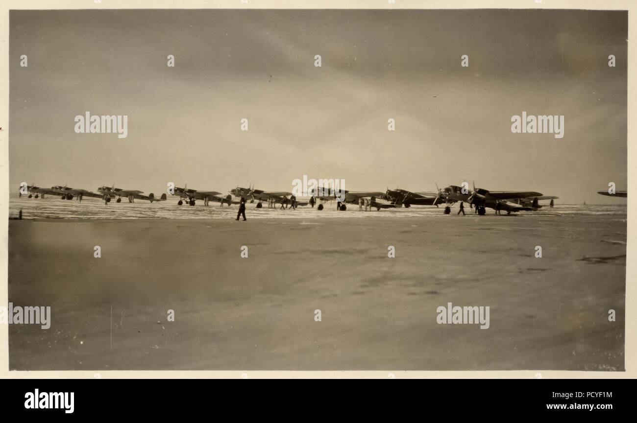 Image from the photo album of Oberfeldwebel Gotthilf Benseler of 9. Staffel, Kampfgeschwader 3: Dornier Do 17 F-1 'Flying Pencils' of 8./KG 153, lined up on the runway in 1938. KG 153 later became KG 3 and the distinctive playing card Staffel Badges of III./KG 153 continued to be used by III./KG 3. Stock Photo