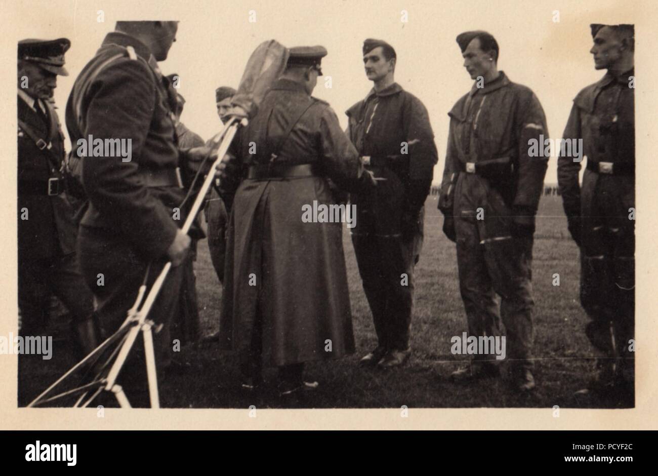 Image from the photo album of Oberfeldwebel Gotthilf Benseler of 9. Staffel, Kampfgeschwader 3: Reichsmarschall Hermann Göring presents Iron Crosses 2nd Class to flight crew of III./KG3 on 25th September 1939, following the successful Poland Campaign. Stock Photo