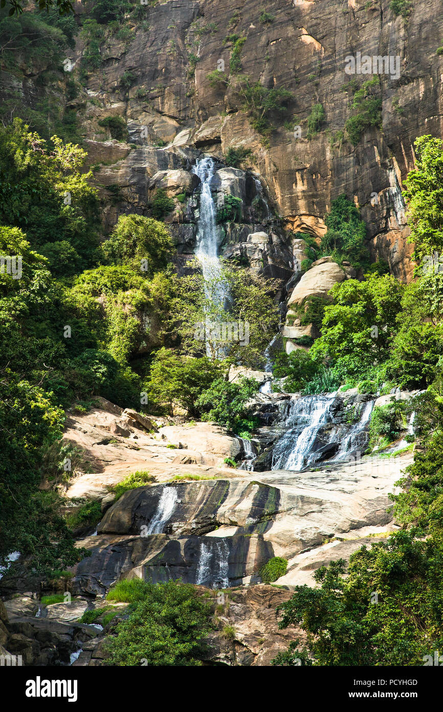 Ravana Falls or Ravana Ella waterfalls is a popular sightseeing attraction near Ella Sri Lanka. Ravana Falls ranks as one of the widest falls in Sri L Stock Photo
