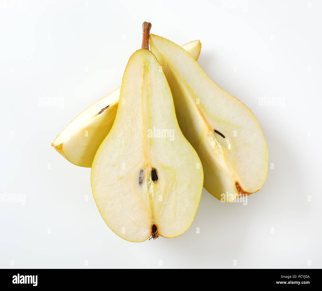sliced yellow pear on white background Stock Photo