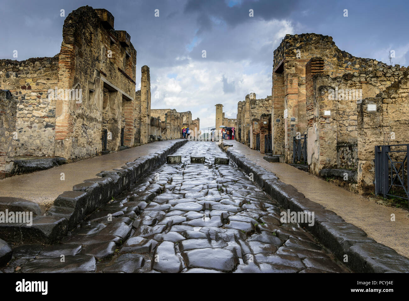 Cobbled main street with cart ruts Pompeii Italy Stock Photo