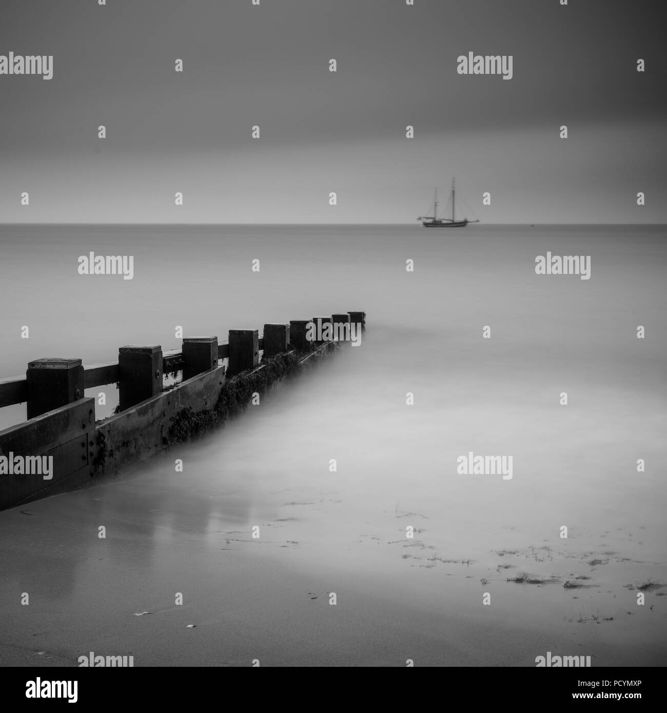 A long exposure black and white view of Swanage Bay in Dorset Stock Photo