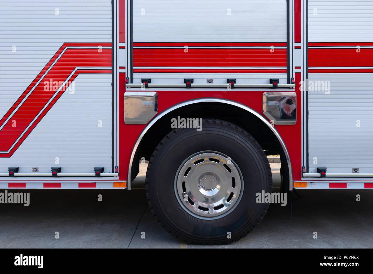 side of a fire truck as background Stock Photo - Alamy