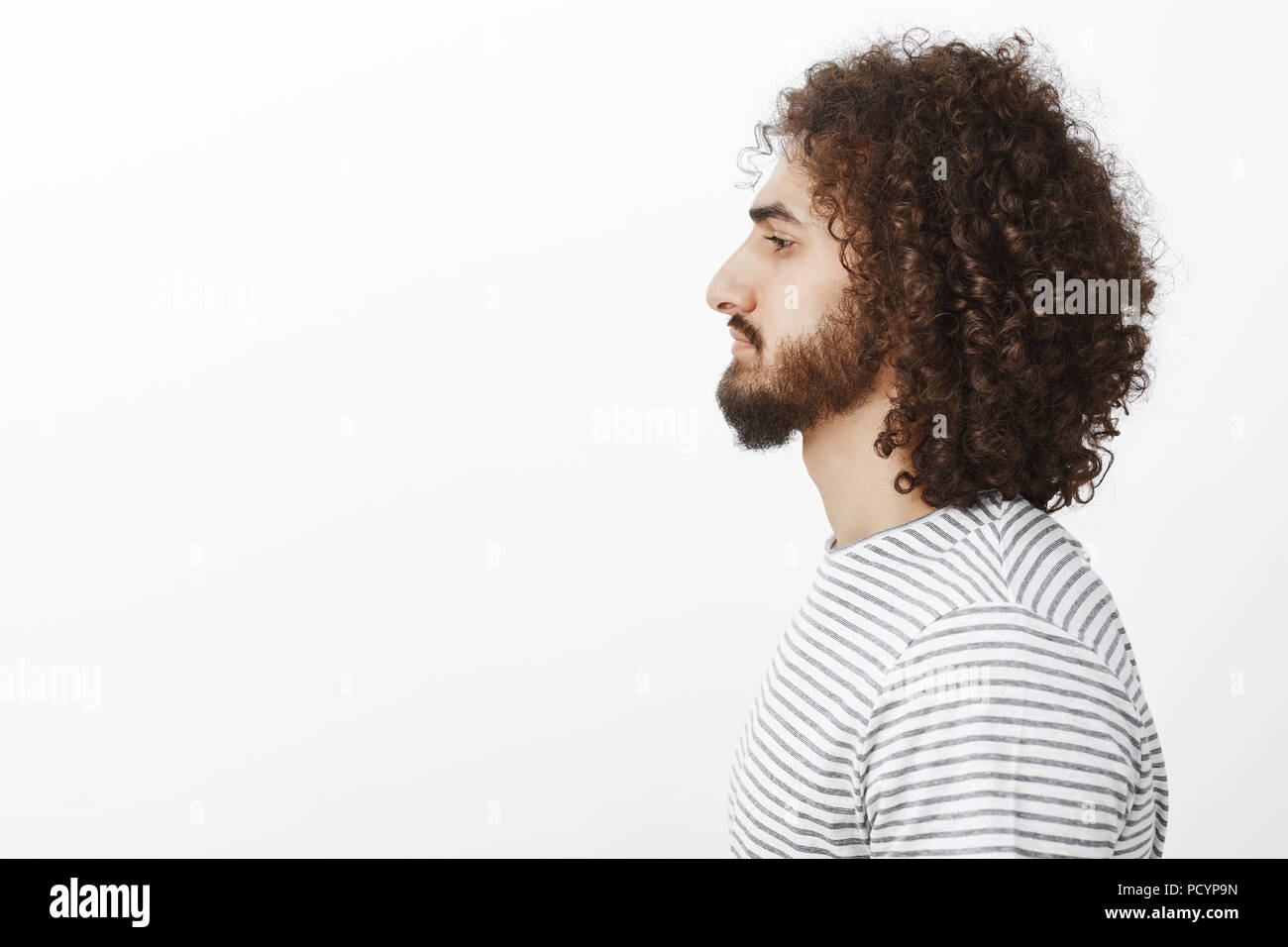 Profile Portrait Of Mature Handsome Hispanic Guy With Beard And